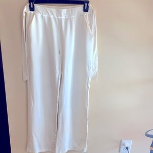 Cato winter pull on white trousers with pockets and self tie belt. Size small